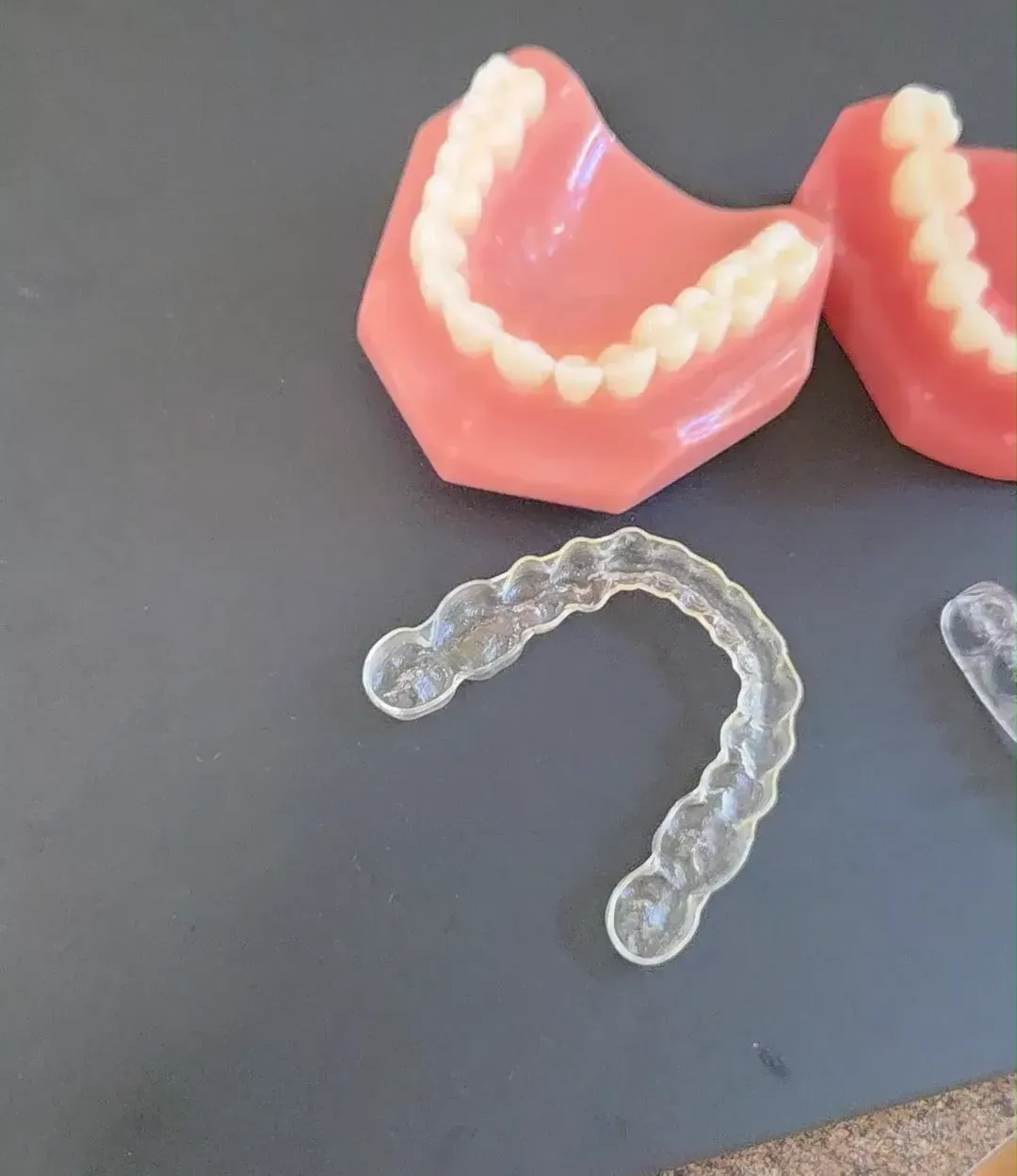 Invisalign aligner on a tray